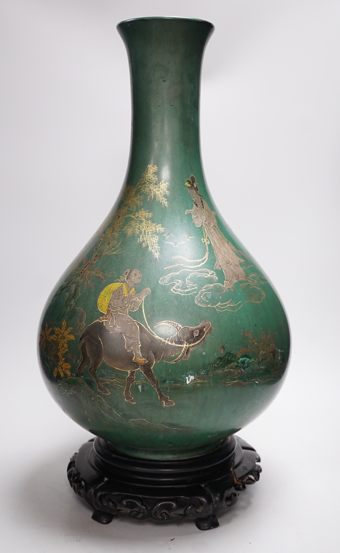 A large Chinese Fuzhou lacquer green ground vase and stand, early 20th century, 54 cm high